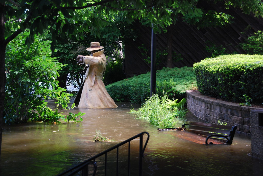 Dick Tracy Statue on Riverwalk in Naperville During Flood