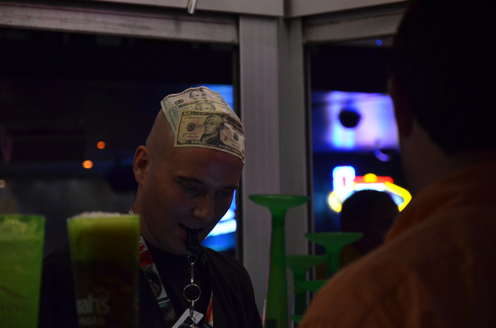 Bartender with Money stuck to Head